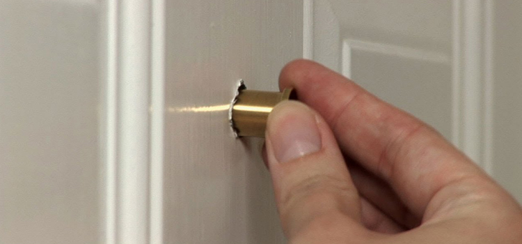 peephole door repair in Brougham