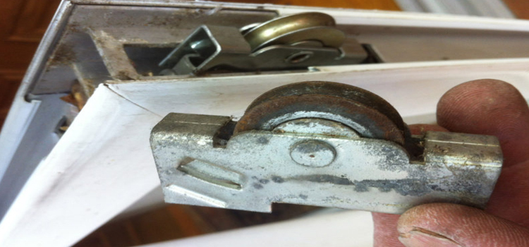 screen door roller repair in Brougham